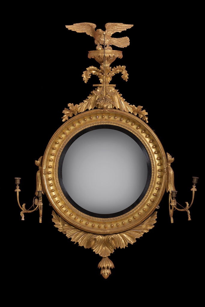 AN EXCEPTIONAL REGENCY CARVED GILTWOOD CONVEX MIRROR - REF No. 6011