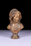 A 19TH CENTURY PLASTER BUST OF A YOUNG GIRL - REF No. 1015