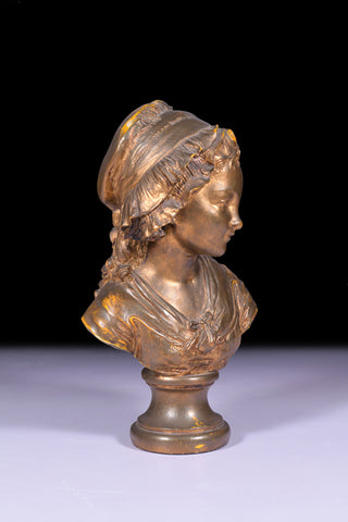 A 19TH CENTURY PLASTER BUST OF A YOUNG GIRL - REF No. 1015